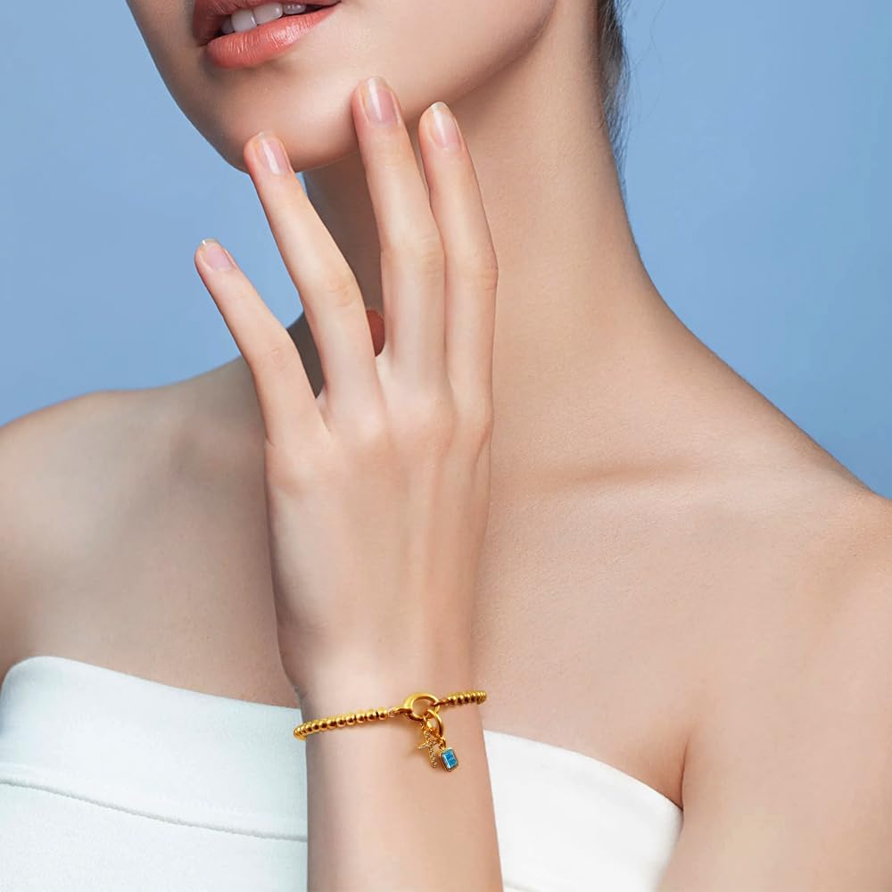 Free bird Cross Birthstone Bracelet | Dainty 14K Gold Plated Cross Charm Bracelet | Stretchable Elastic Gold Beaded Bracelet